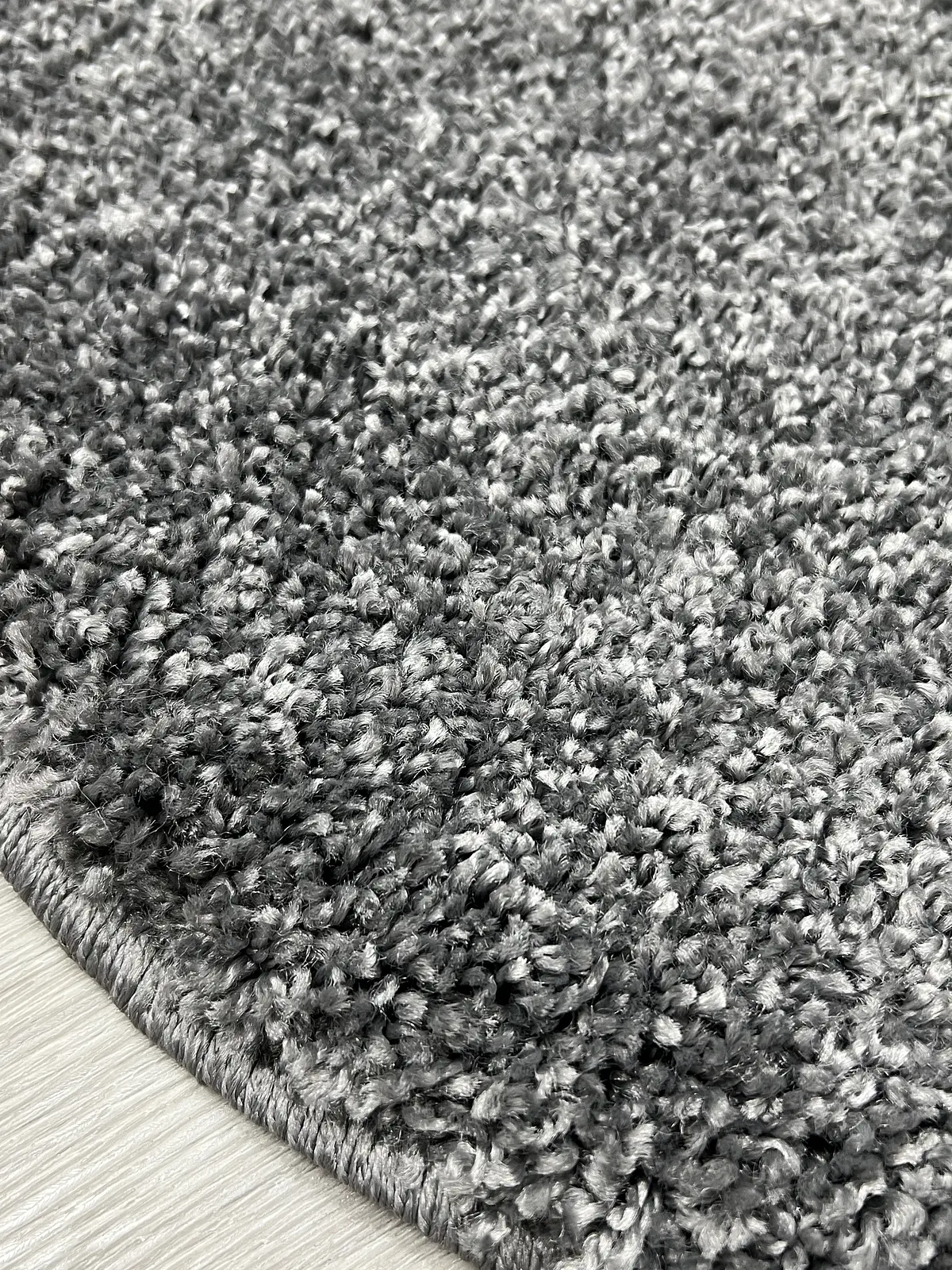 Пухнастий килим Plumeria dark gray 12500/60